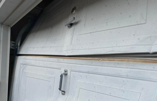 Panel garage door repair